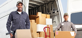 Delivery man near a shipping truck